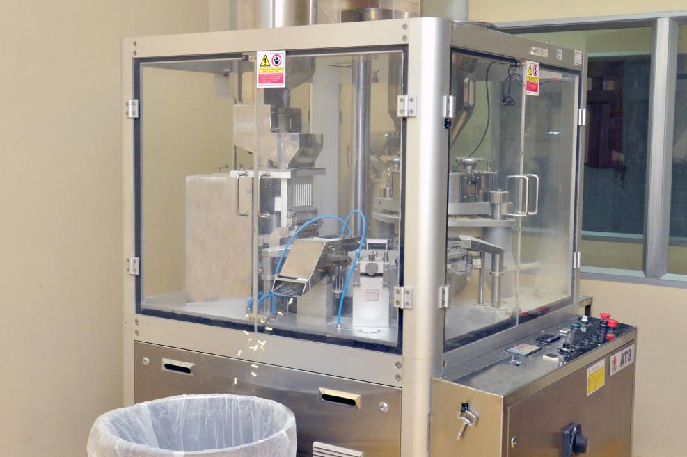 Producing capsule through automatic machine